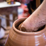 Doug Fitch and Hannah McAndrew making a jug for me